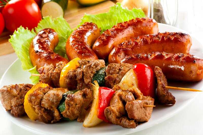 Grilled sausages and meat skewers