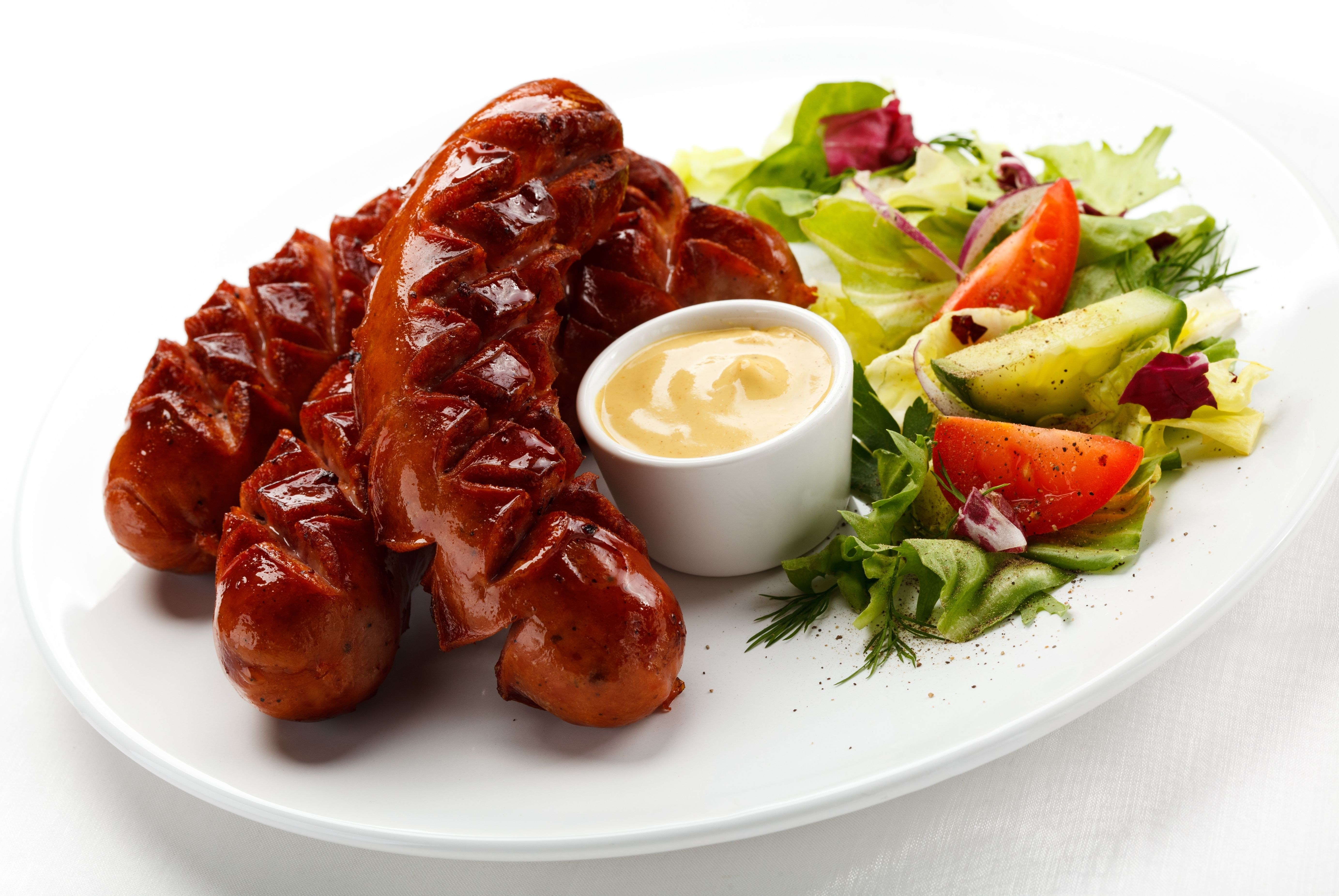 grilled sausages with salad