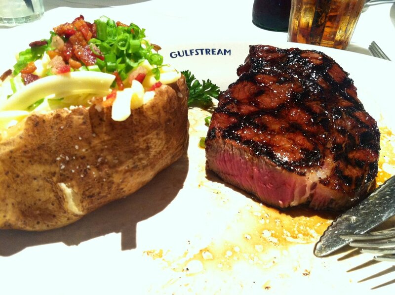 Grilled steak and baked potato