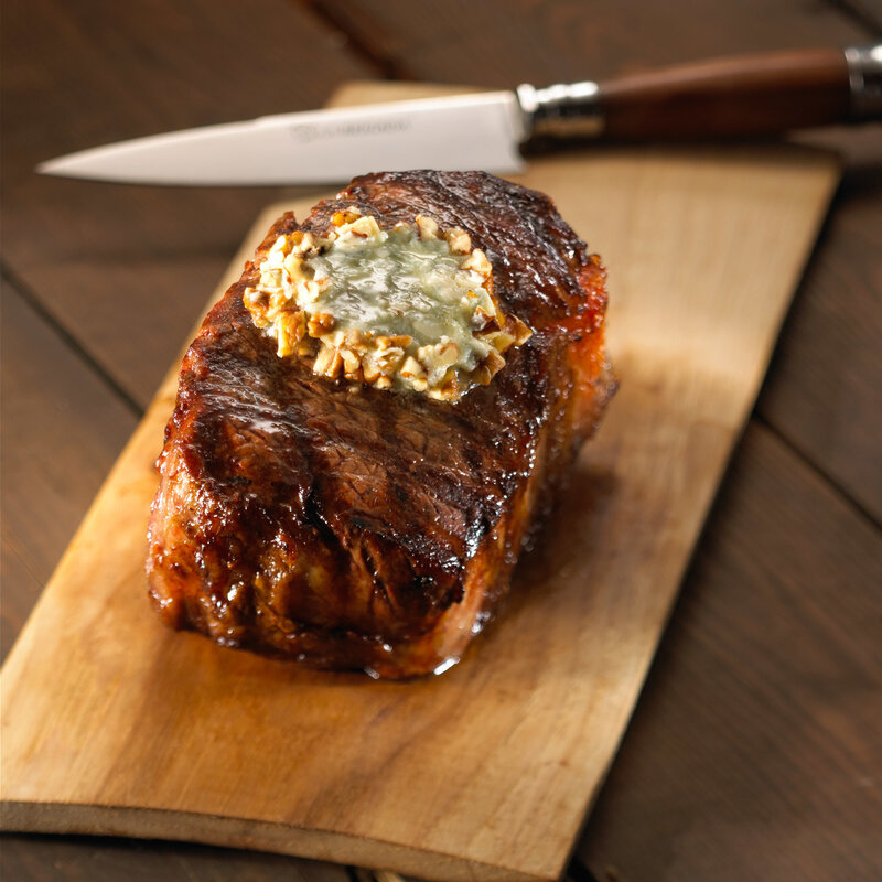 Grilled steak with compound butter