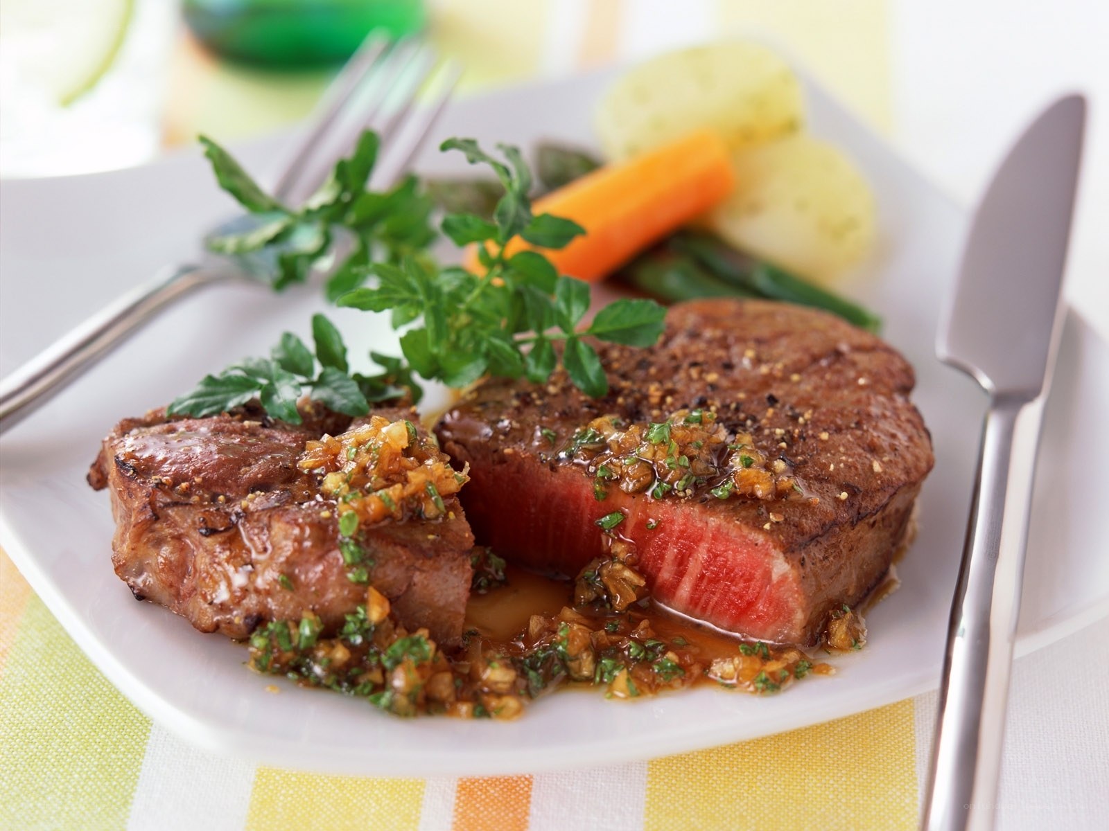 Grilled steak with herb sauce