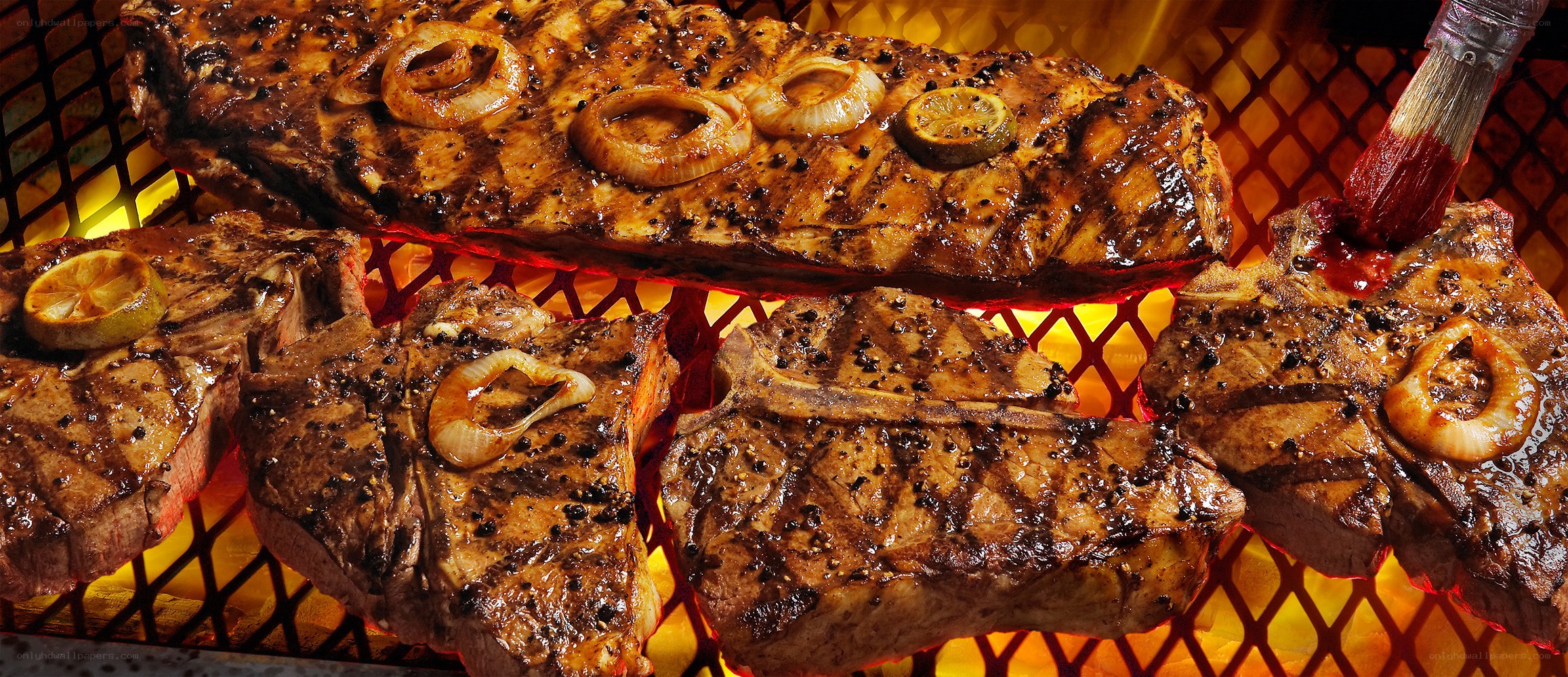 Grilled steaks on a barbecue
