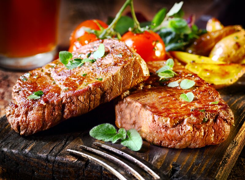Grilled Steaks on Wood