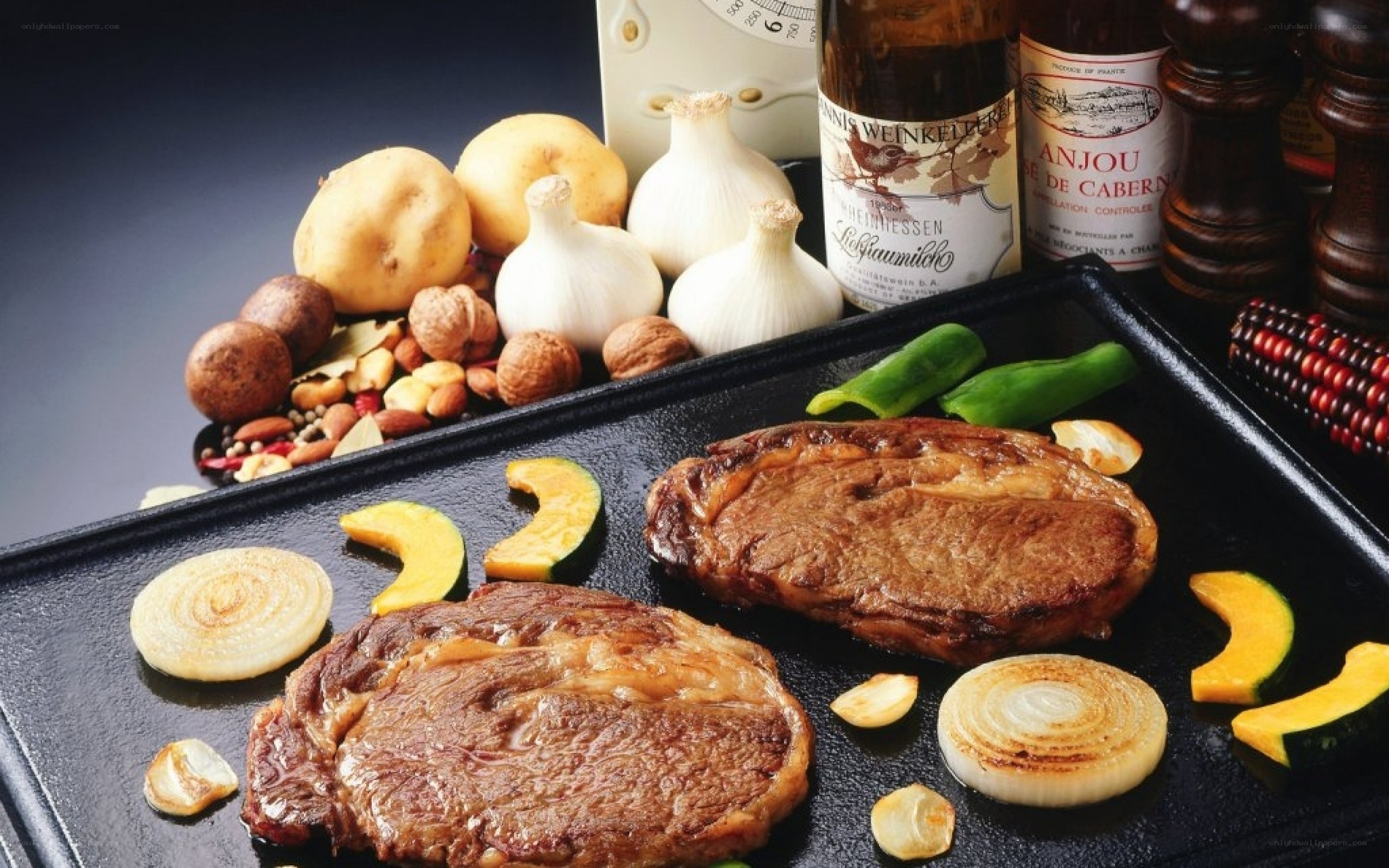 Grilled steaks with vegetables