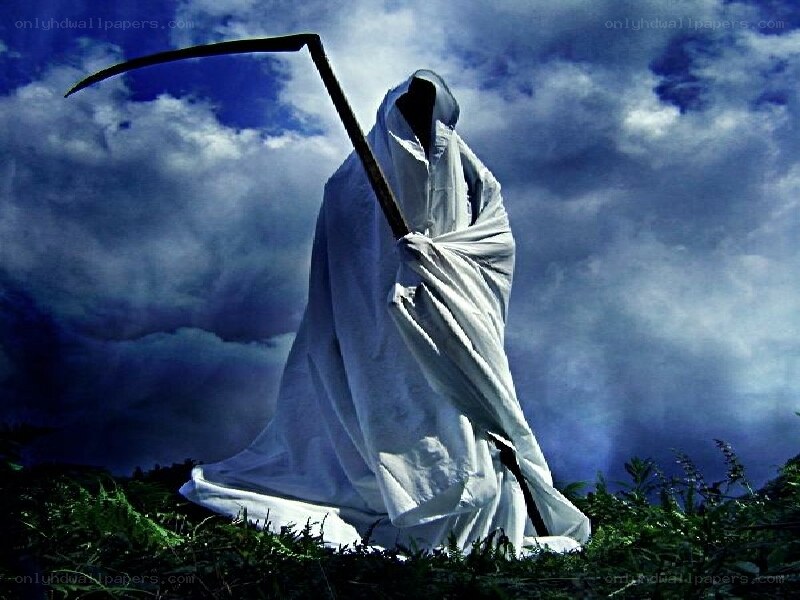 Grim Reaper figure on hill
