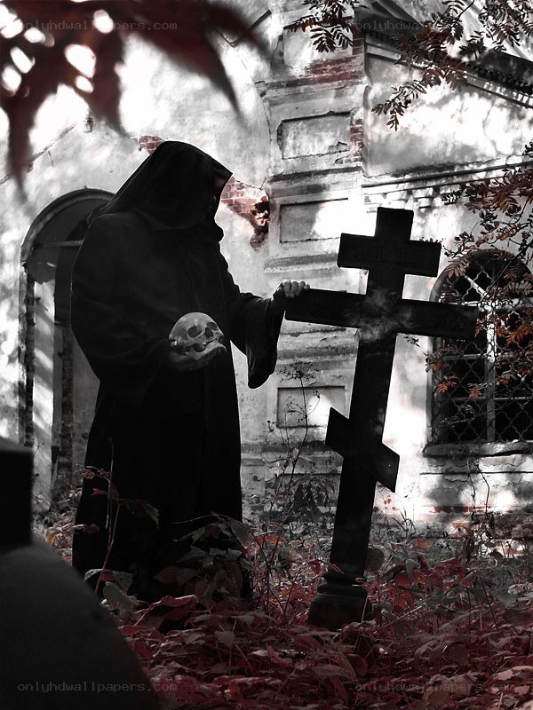 Grim reaper in a cemetery