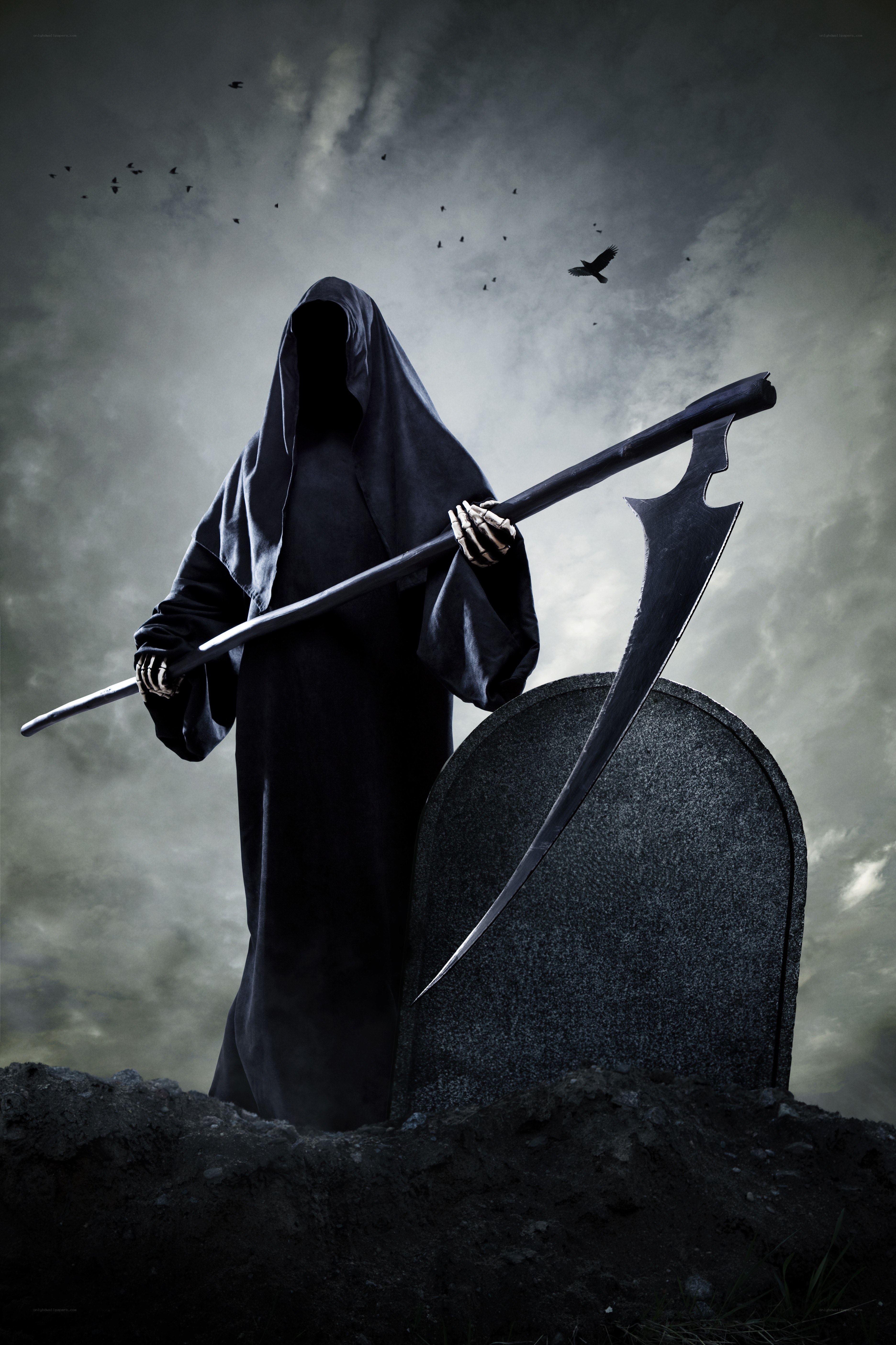 Grim reaper in a graveyard
