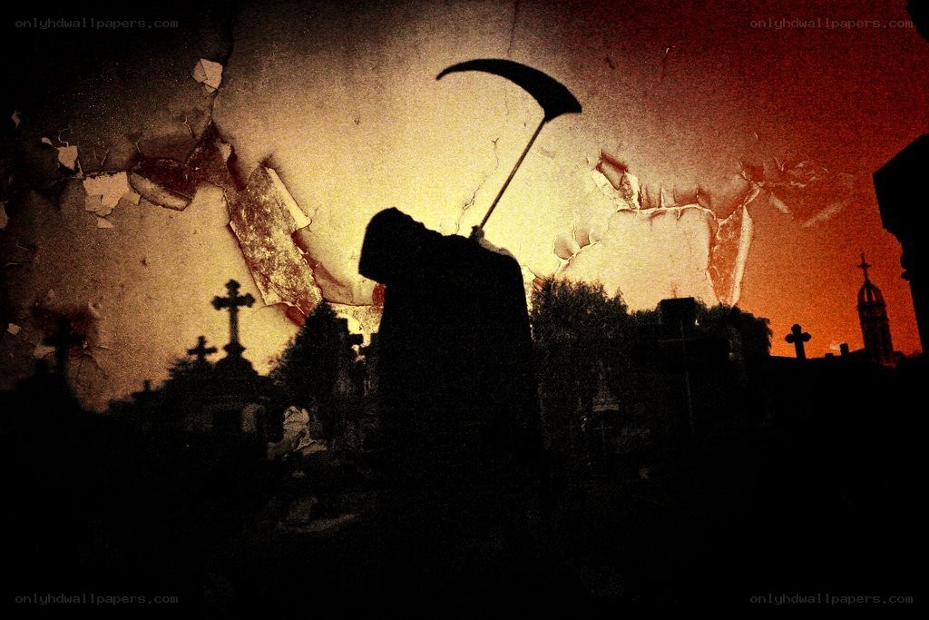 Grim reaper in cemetery