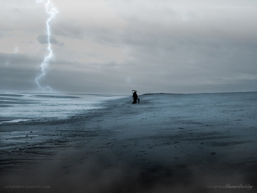 Grim Reaper on a stormy beach