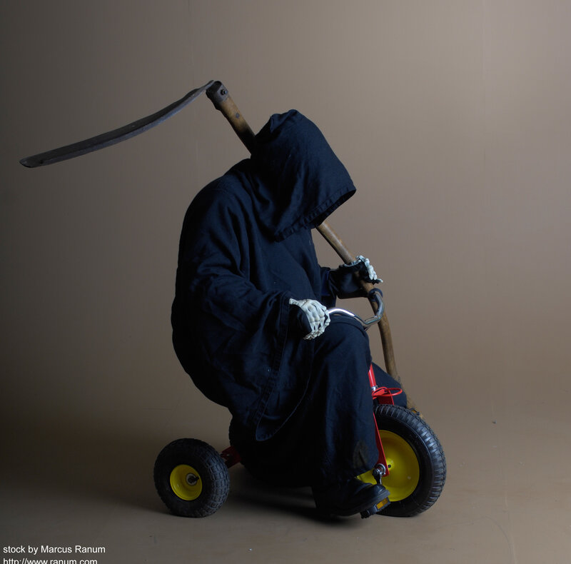Grim Reaper on Tricycle — Black, Dramatic, Photograph