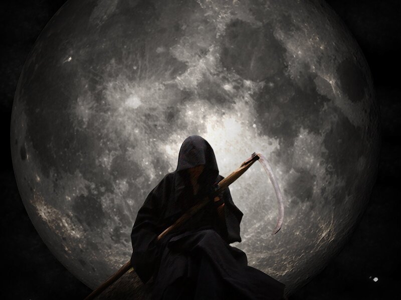 Grim Reaper under full moon