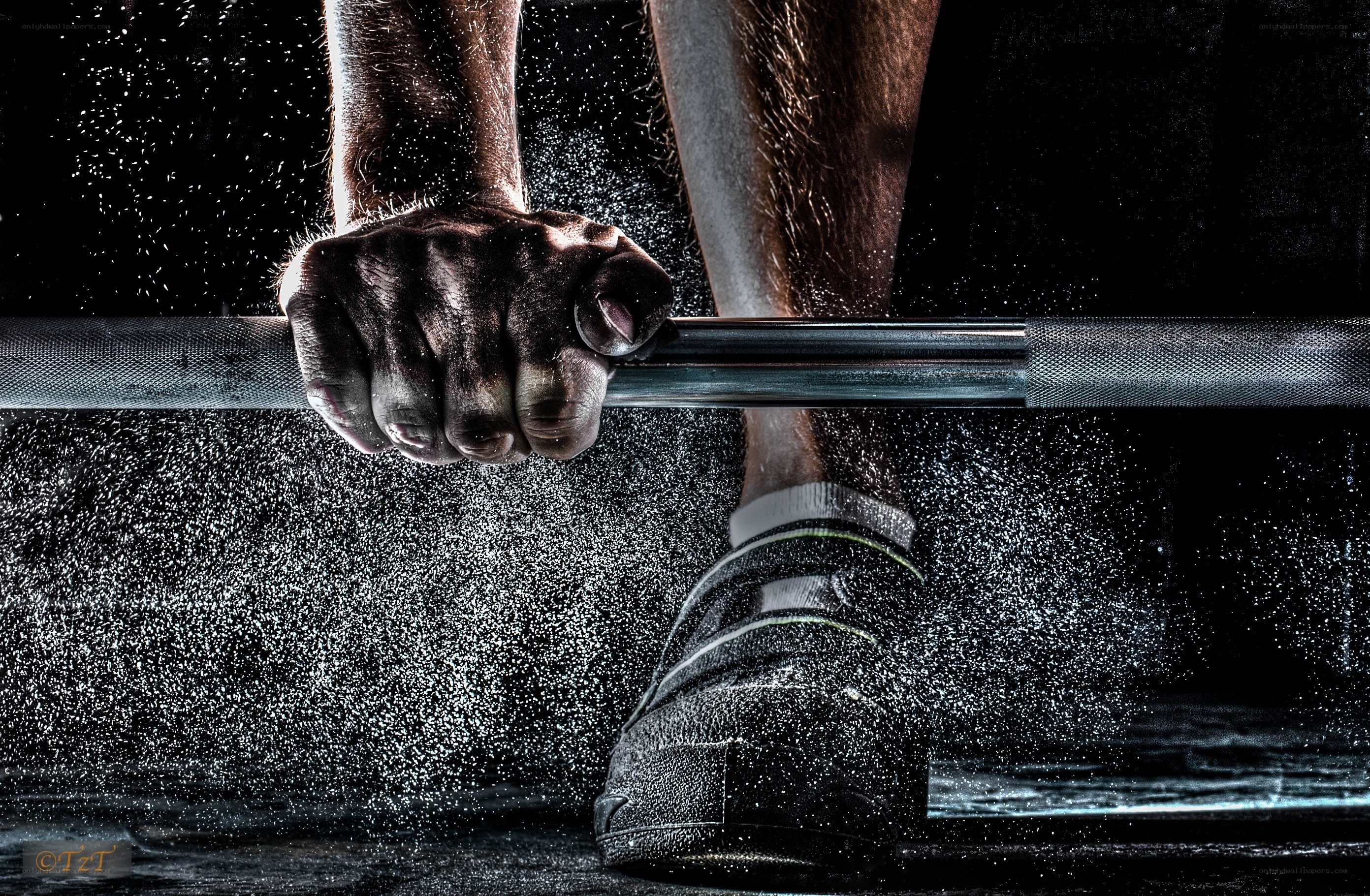 gripping barbell with powder