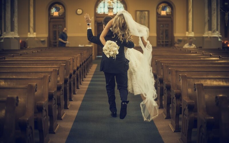 Groom Carrying Bride — White