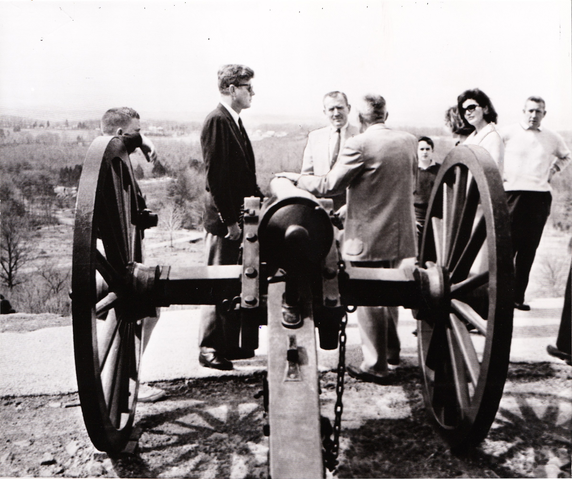 Group at a cannon on a hill