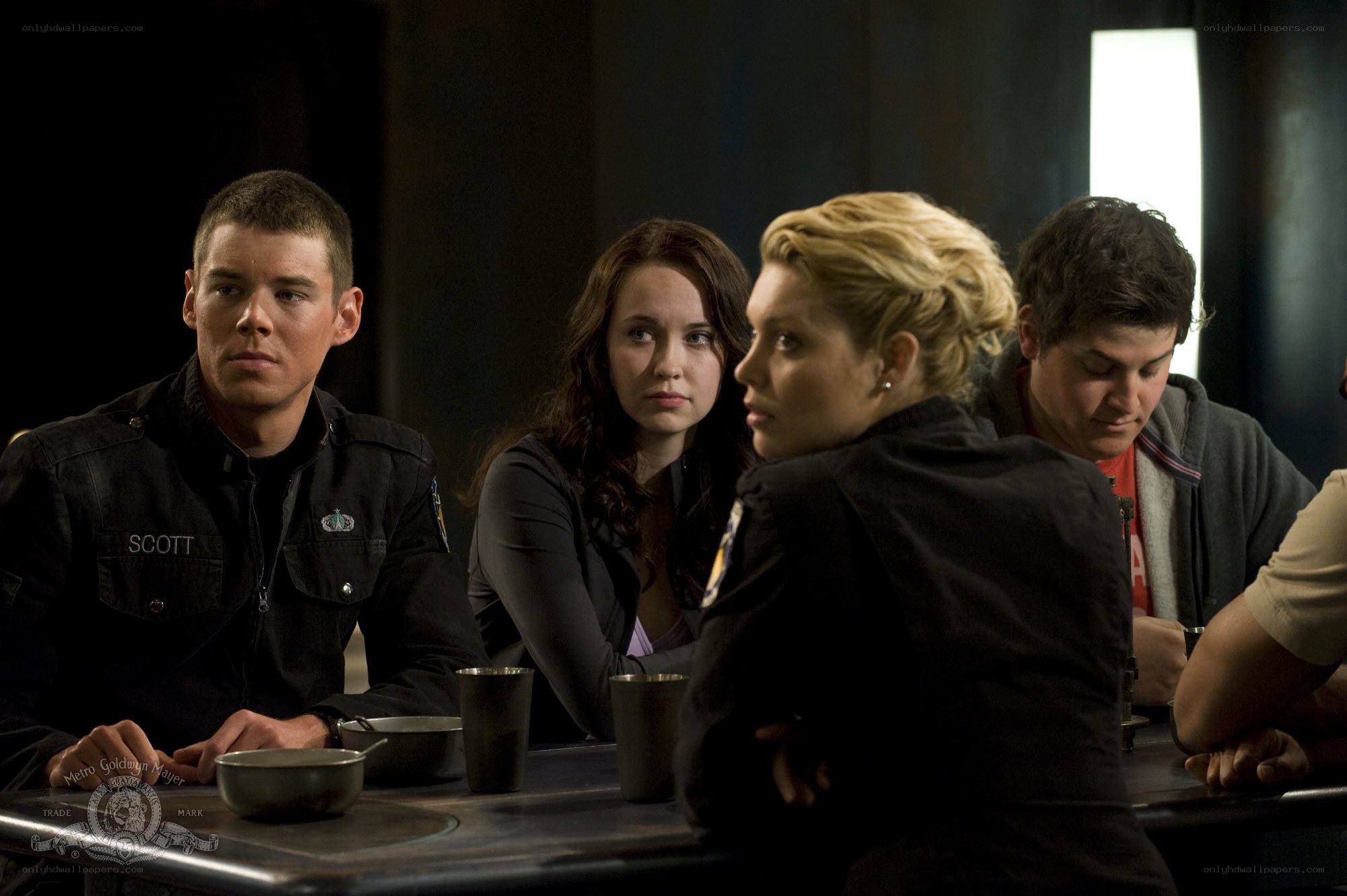 Group at a table in dark room