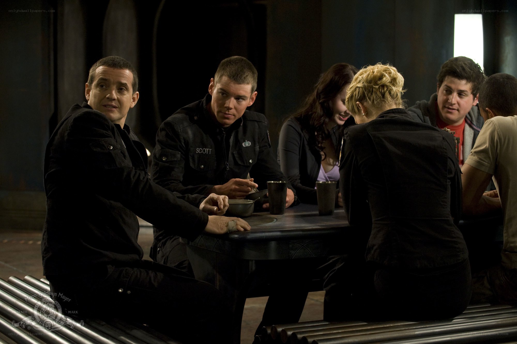 Group at a table in dark room