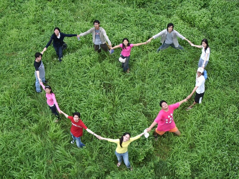 Group holding hands in a circle