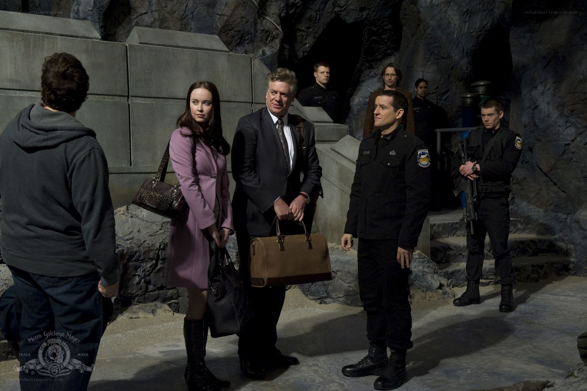 Group in a cave-like facility