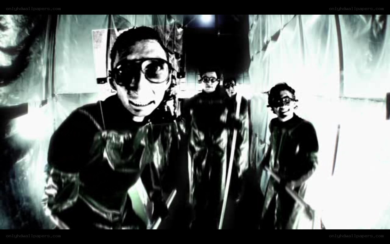group in dark room with goggles