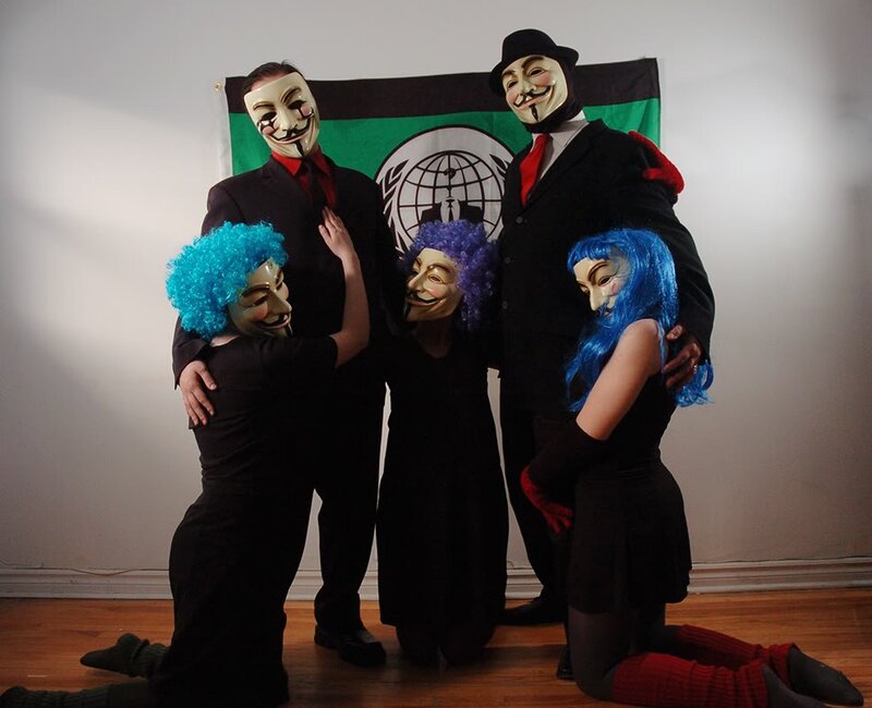 Group in Guy Fawkes masks