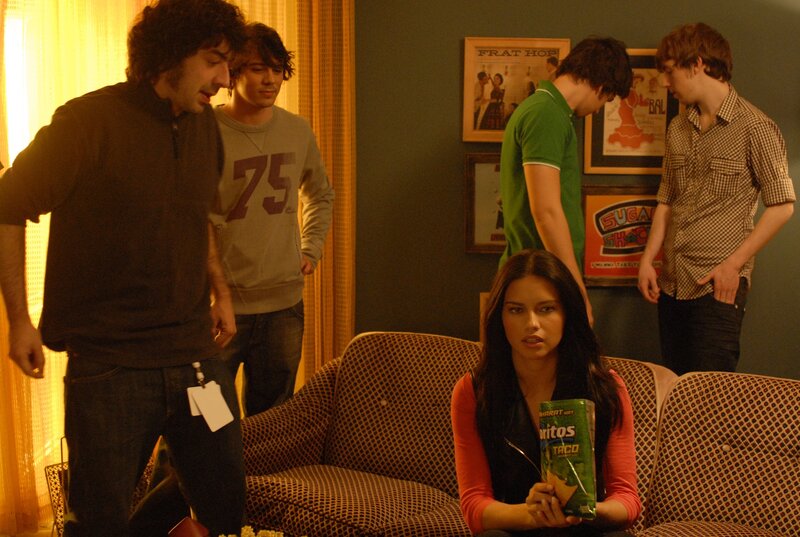 Group in living room with snacks