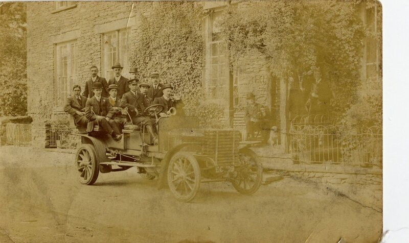Group in vintage car