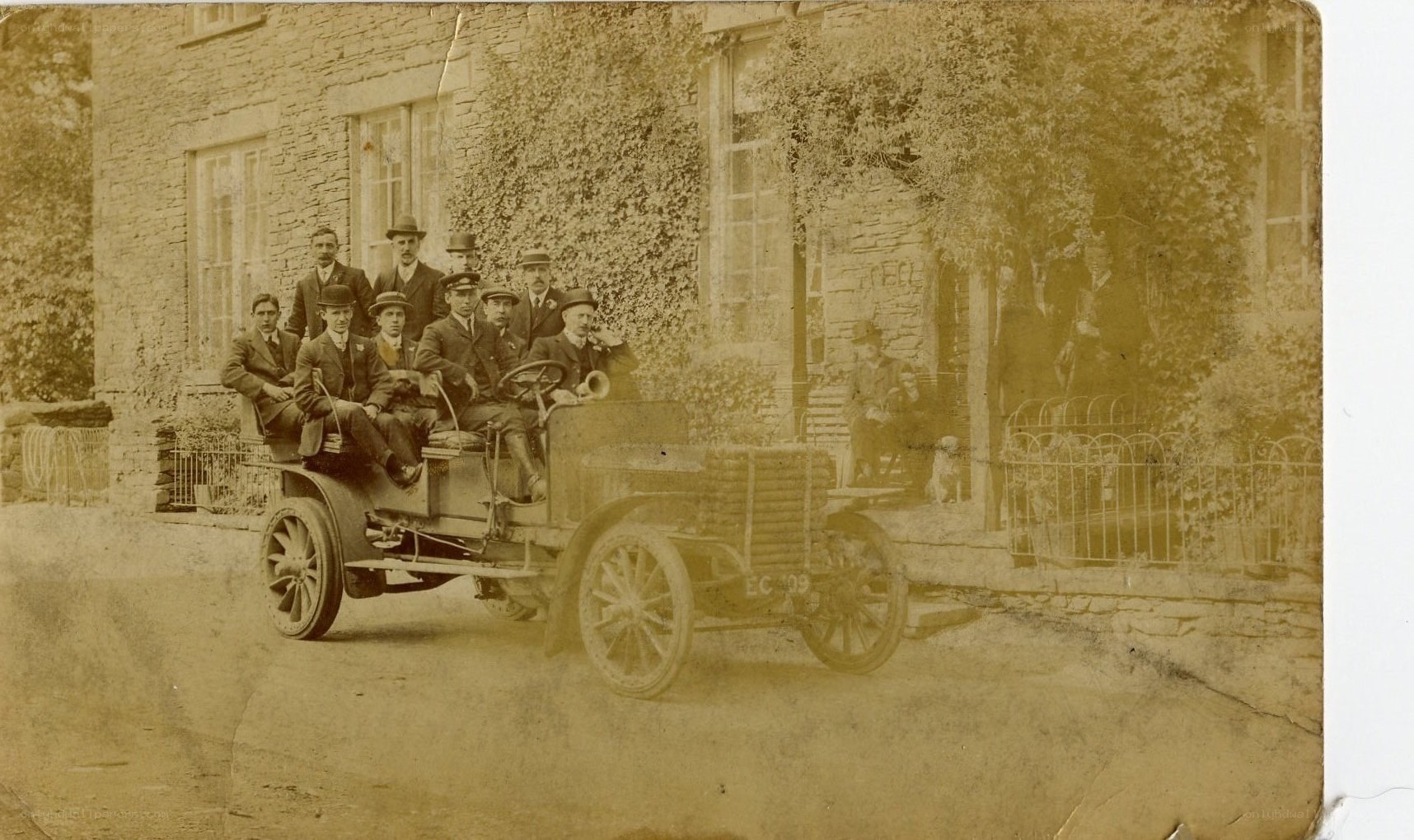 Group in vintage car