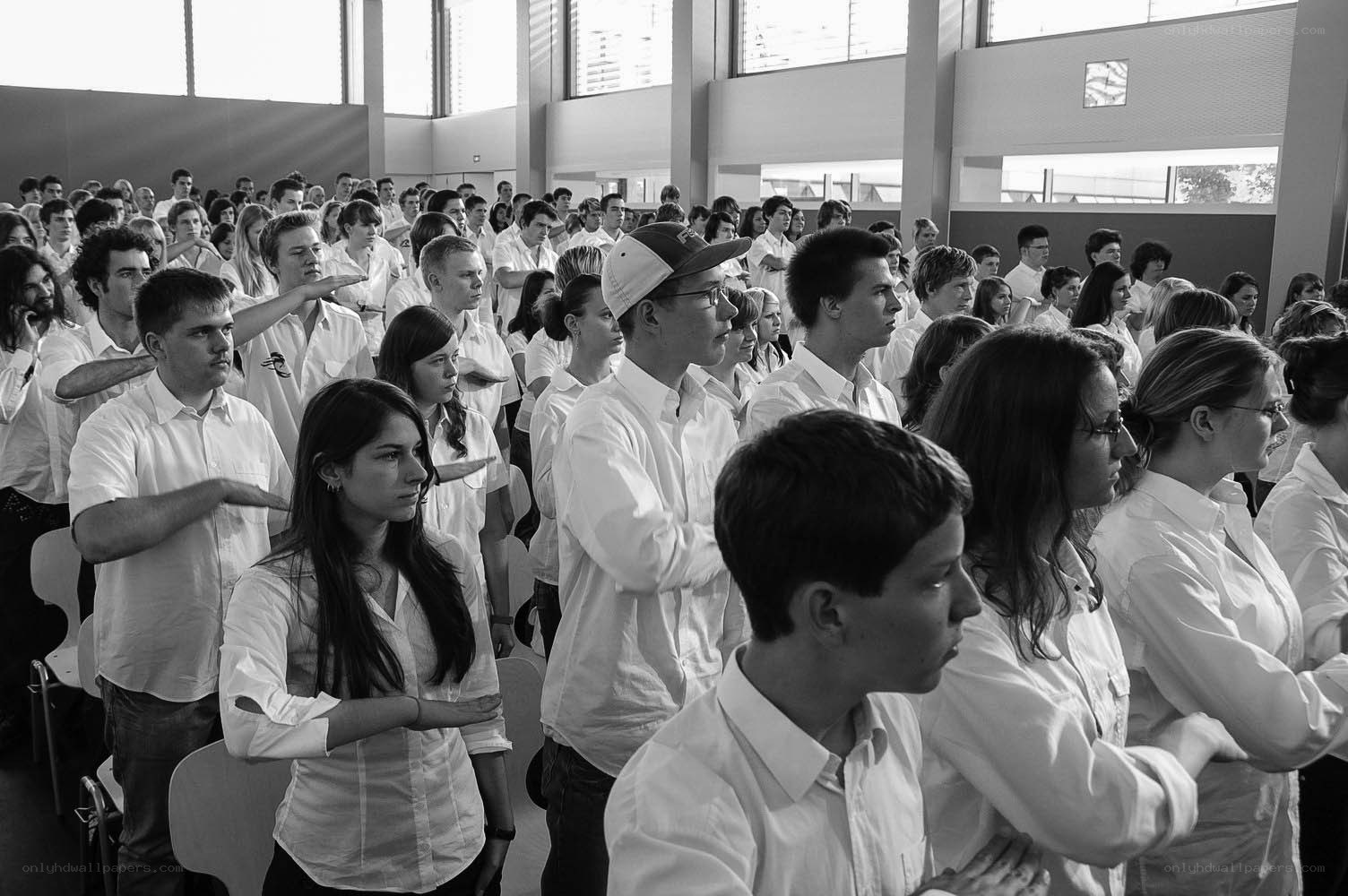Group in white shirts at event