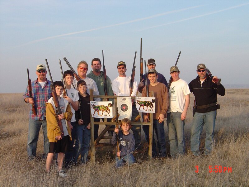 Group of hunters with rifles