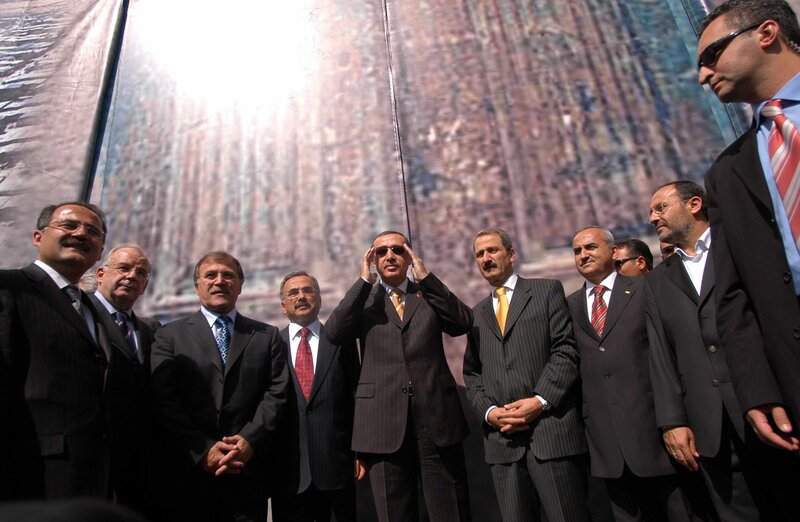 Group of men in suits at event