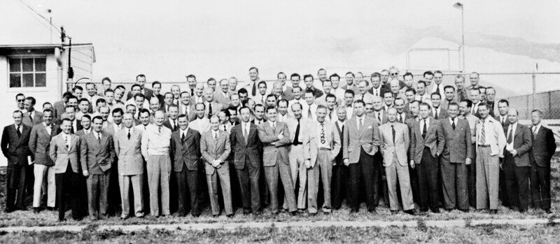 Group of men in suits outdoors