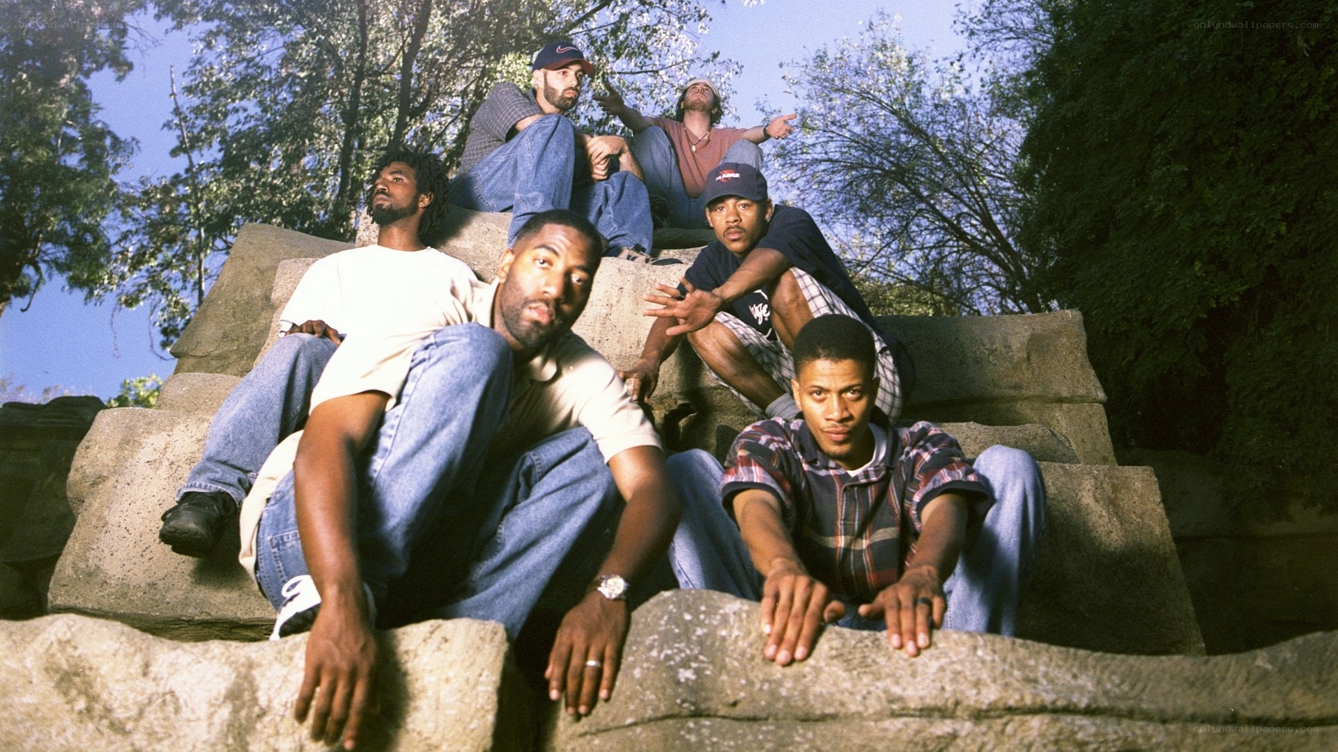 group of men on stone steps