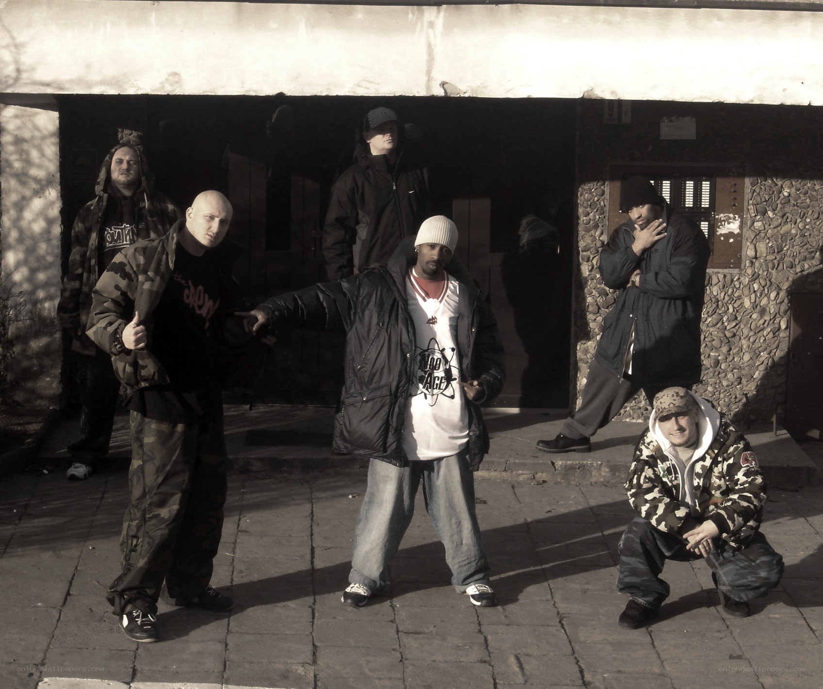 group of men posing outside