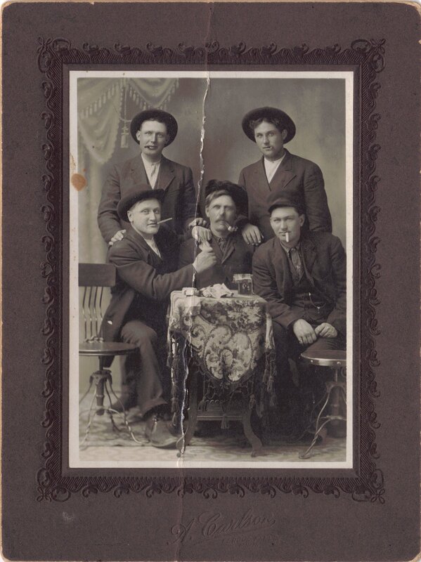 Group of men with pipes