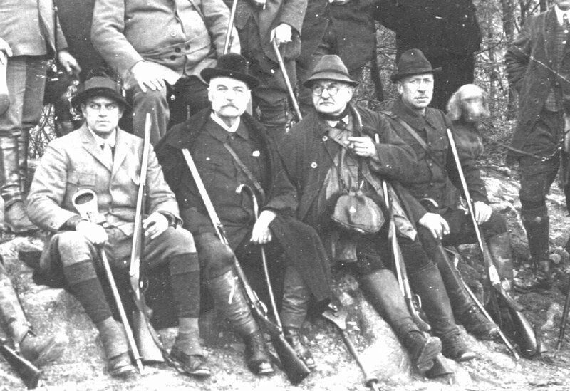 Group of men with rifles