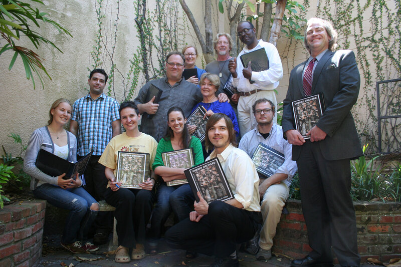 Group of People Holding Books