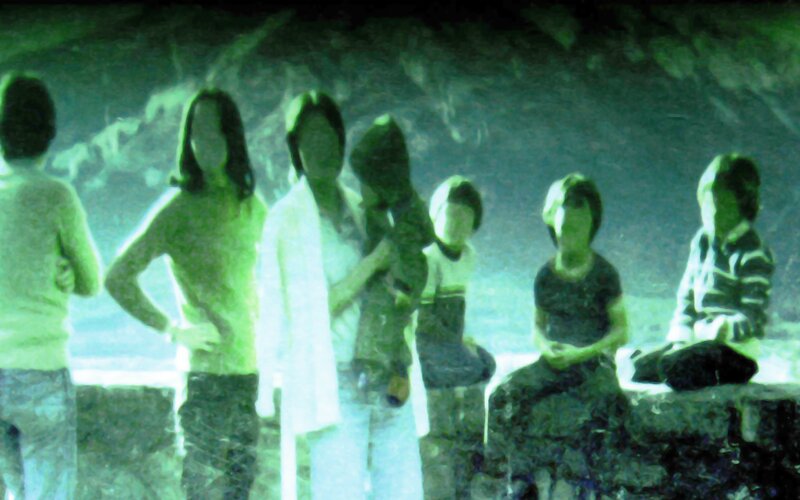 Group of People in Cave — Green