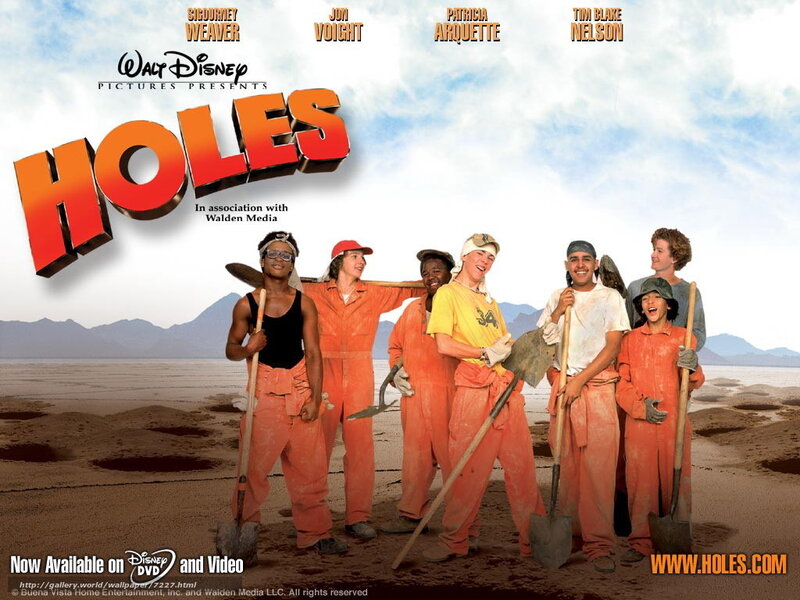 Group of People in Orange Jumpsuits