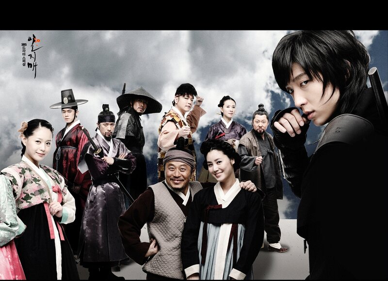 Group of People in Traditional Clothing — Black