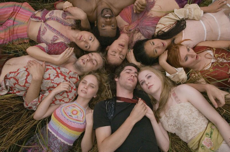 Group of people lying in a circle