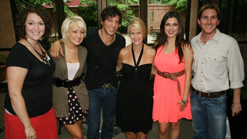 Group of people posing for photo