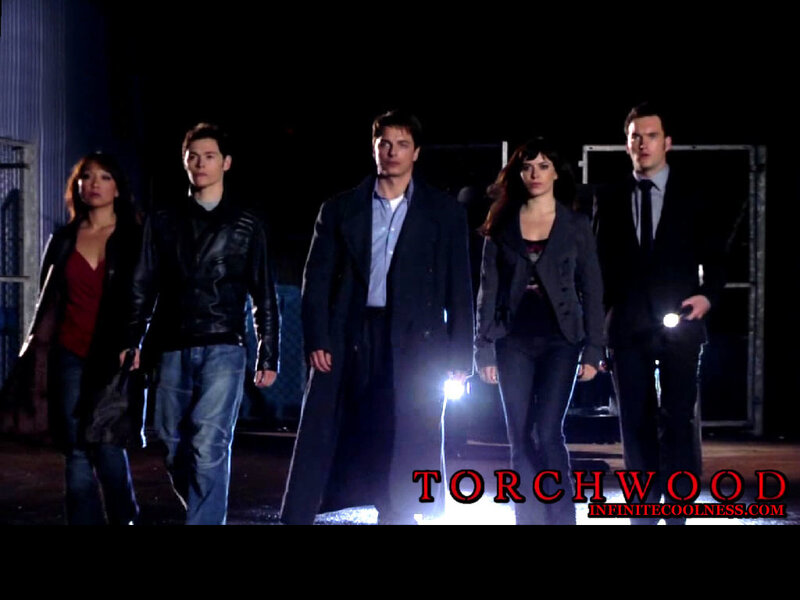 group of people walking at night