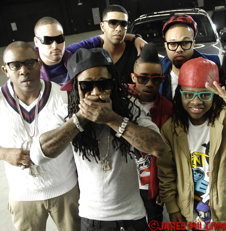 group of rappers posing together