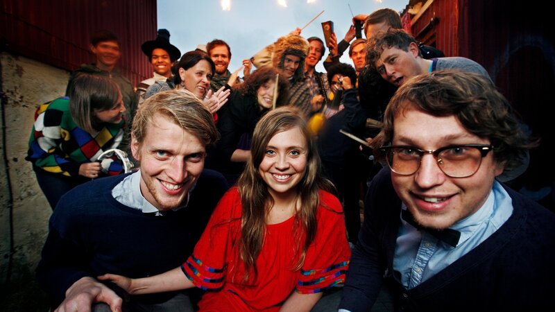Group of smiling people at event
