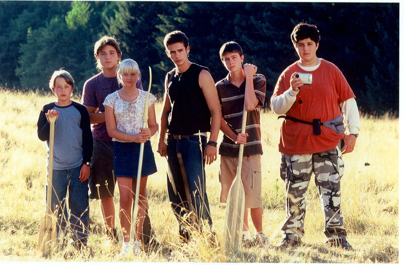Group of teens with paddles