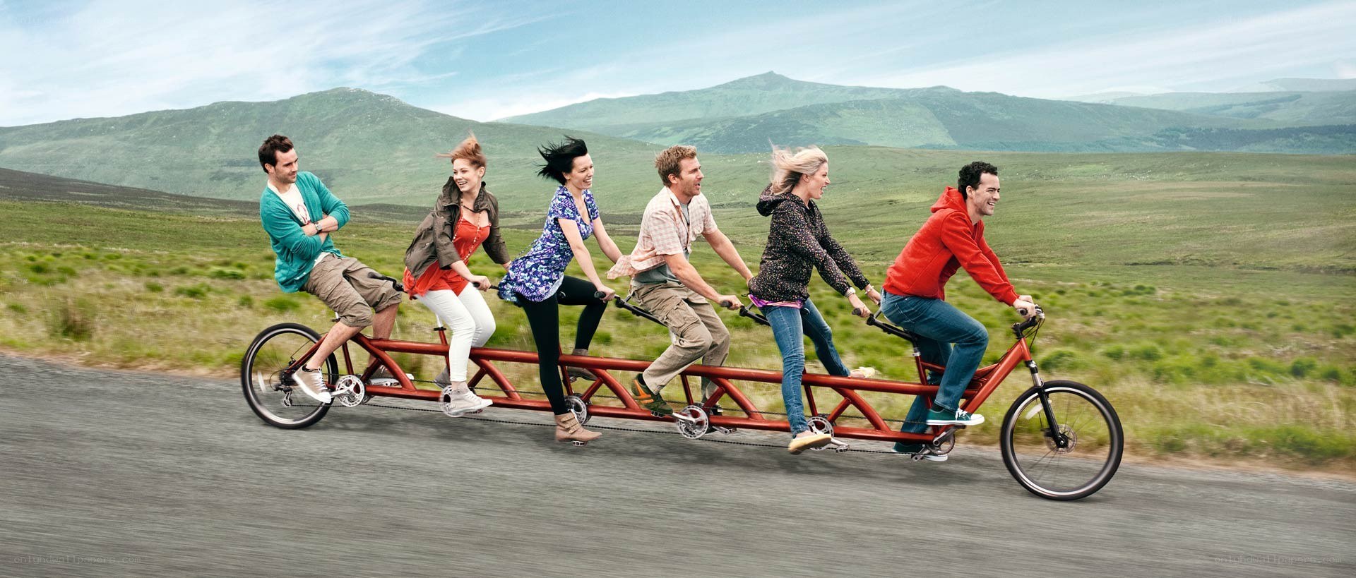 Group on a tandem bicycle