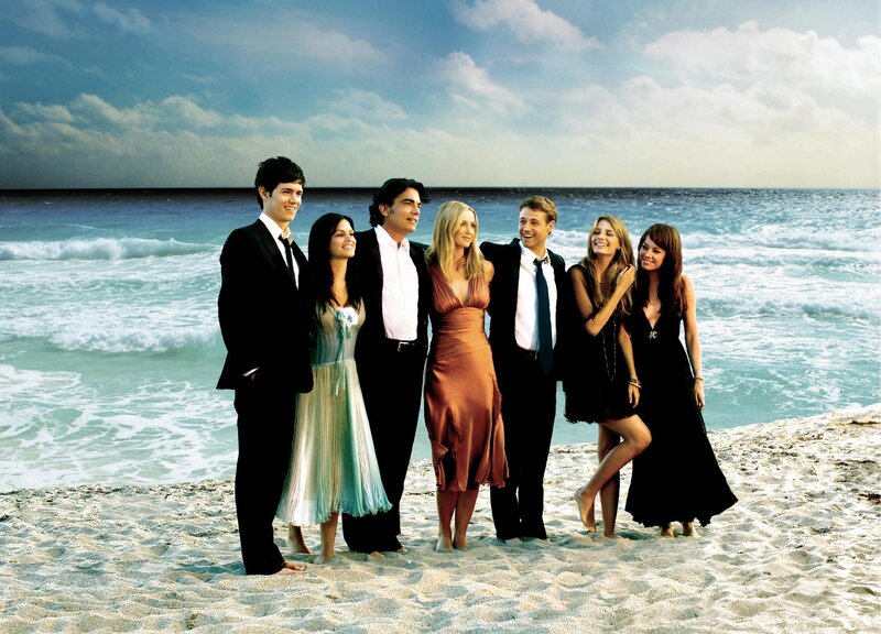 Group on the beach in formal wear