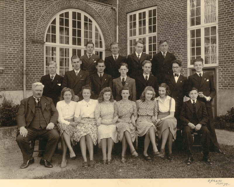 Group portrait of students and teacher