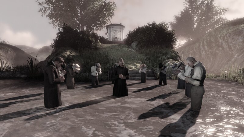 group praying in a field