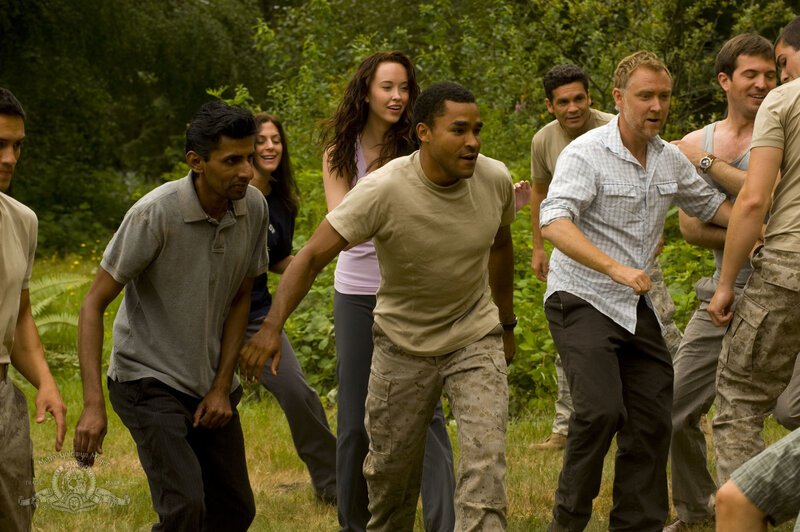 Group running through forest